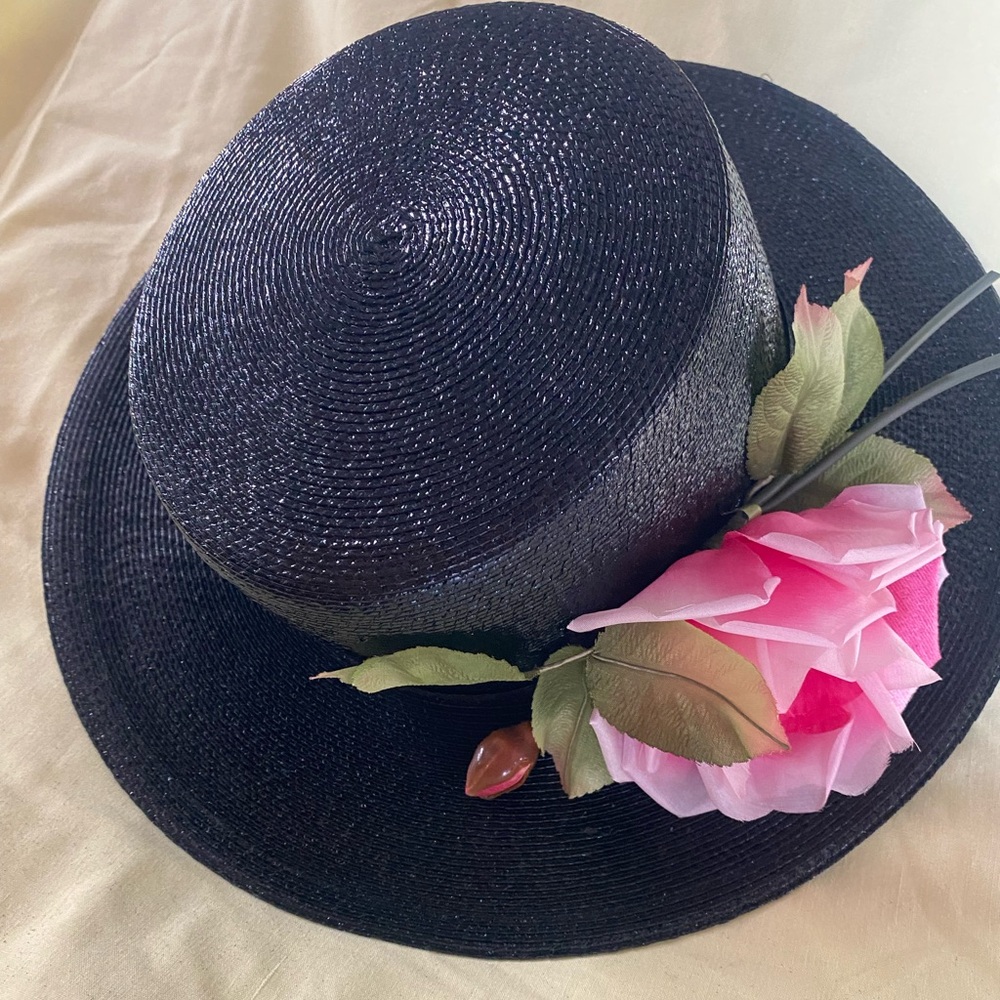 Elegant Black Hat with Pink Floral Accent